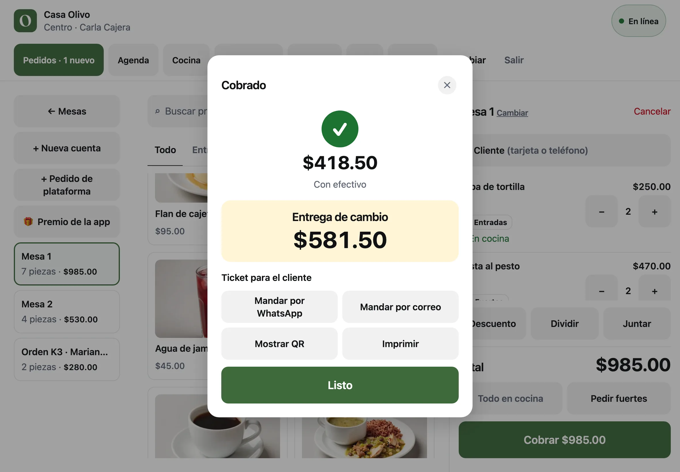 La ventana Cobrado con $418.50 en efectivo, Entrega de cambio $581.50 y las opciones del ticket